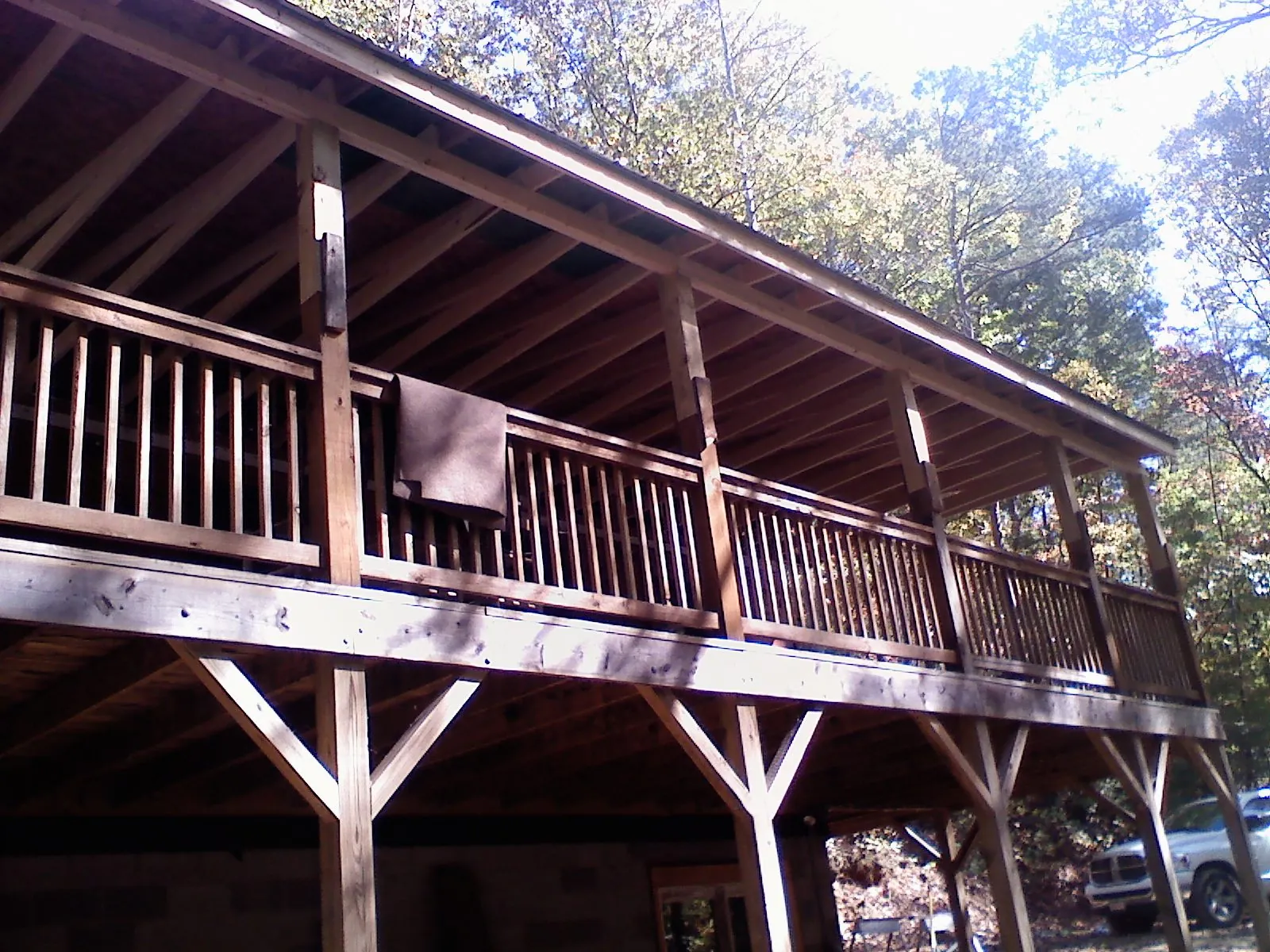 Timber framing under a new elevated porch and deck — Roof Leak Repair in Canaan by Roofing Brothers